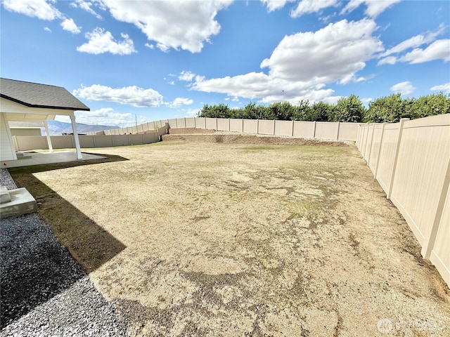 2575 1st St SE, East Wenatchee, WA 98802 - fenced backyard featuring a patio area