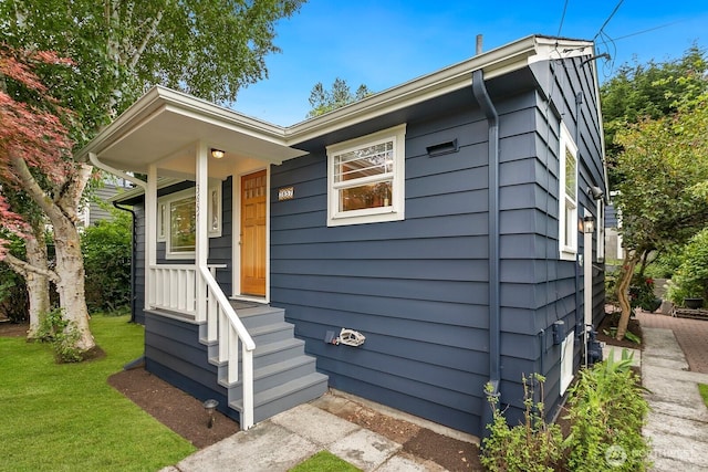 3657 23rd Ave W, Seattle, WA 98199 - view of front of property with a front yard