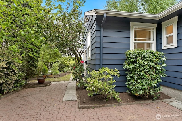 3657 23rd Ave W, Seattle, WA 98199 - view of home's exterior featuring a patio area