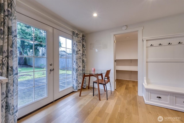 entryway with light wood-type flooring, recessed lighting, baseboards, and french doors