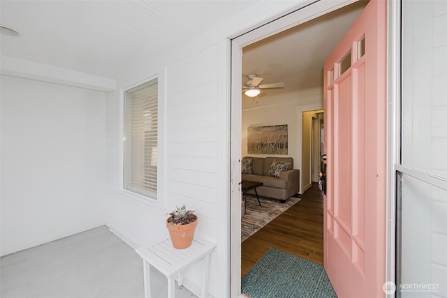 hall featuring wood finished floors