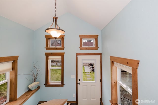 entryway featuring vaulted ceiling