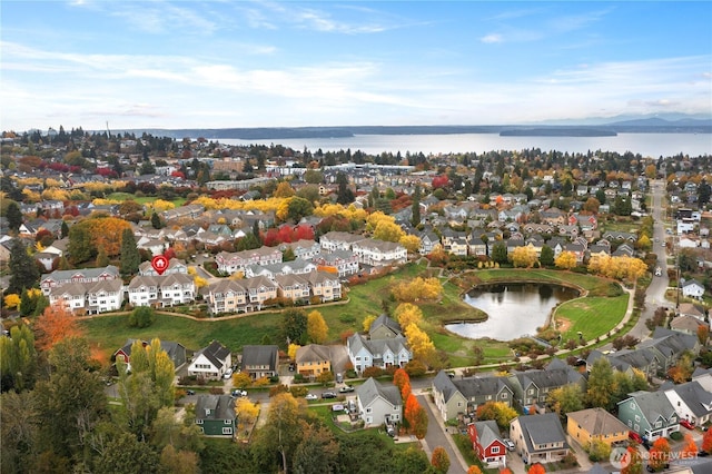 aerial view featuring a water view and a residential view