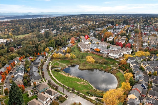 aerial view featuring a residential view and a water view