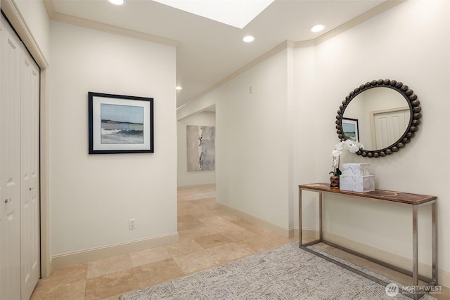 corridor with recessed lighting, baseboards, and ornamental molding