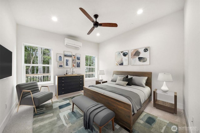 bedroom featuring ceiling fan, a wall unit AC, recessed lighting, light colored carpet, and baseboards