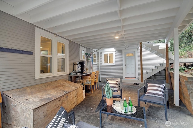 view of patio / terrace featuring stairs