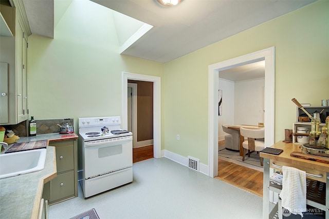 kitchen with visible vents, baseboards, light countertops, a sink, and white electric stove