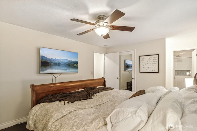 bedroom with ceiling fan and baseboards