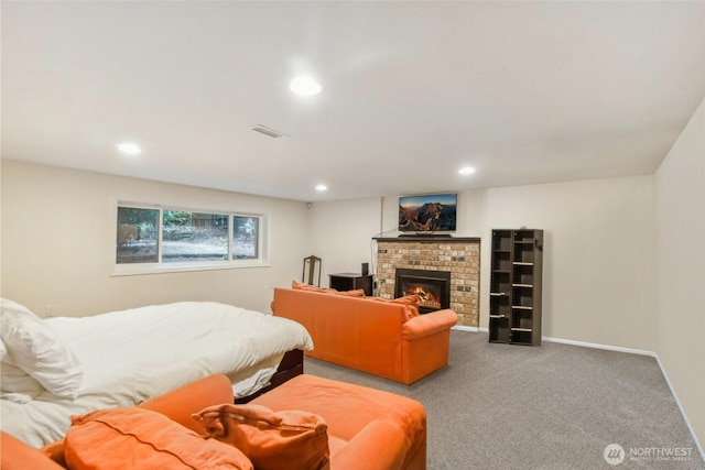 bedroom with recessed lighting, a fireplace, carpet flooring, visible vents, and baseboards