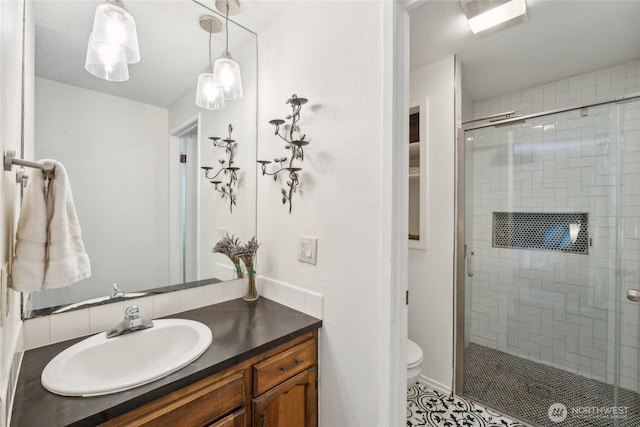 19711 34th Dr SE, Bothell, WA 98012 - full bathroom with a shower stall, vanity, toilet, and tile patterned flooring