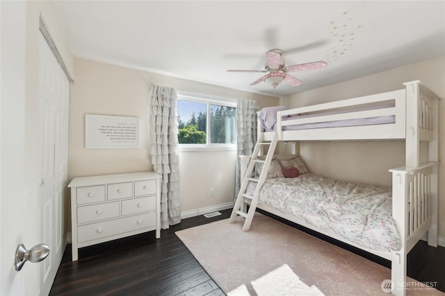 19711 34th Dr SE, Bothell, WA 98012 - bedroom featuring dark wood finished floors, baseboards, and ceiling fan