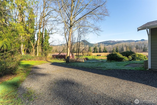 exterior space featuring a mountain view