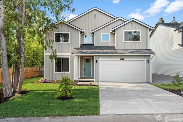 view of front of home featuring roof with shingles, concrete driveway, an attached garage, board and batten siding, and fence