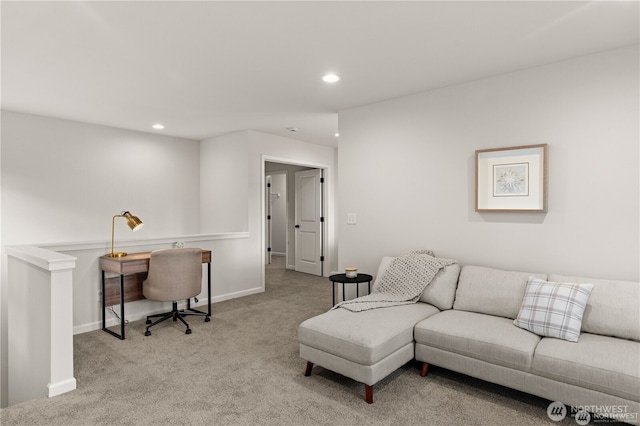 carpeted living area with baseboards and recessed lighting