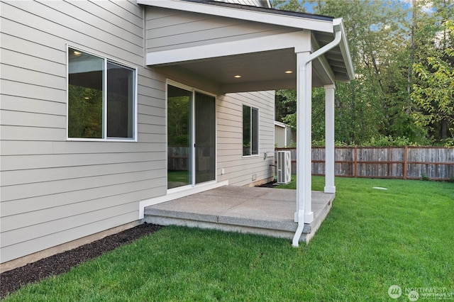 exterior space with a yard, a patio area, and fence