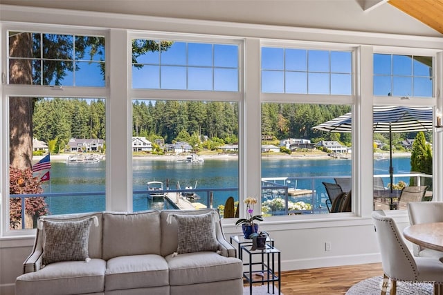 sunroom with a water view