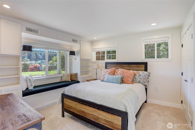 bedroom with recessed lighting, baseboards, visible vents, and light colored carpet