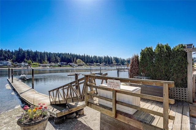 view of dock with a water view