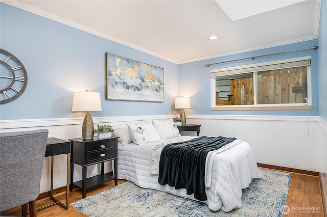 bedroom featuring crown molding, recessed lighting, and wood finished floors