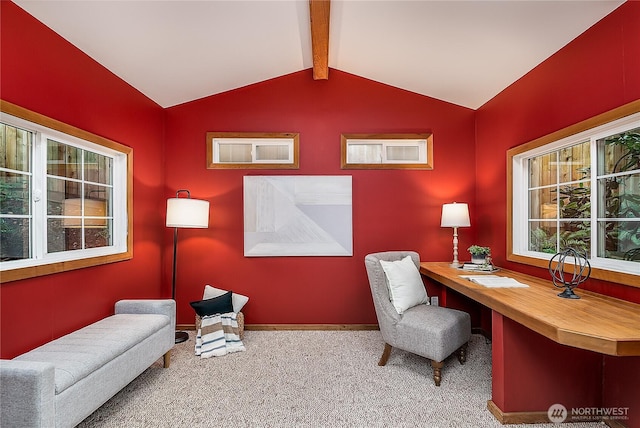 carpeted office featuring lofted ceiling with beams