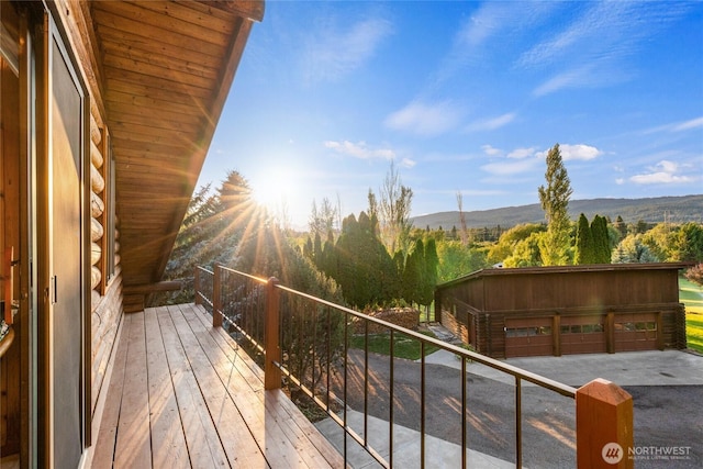 balcony featuring a mountain view