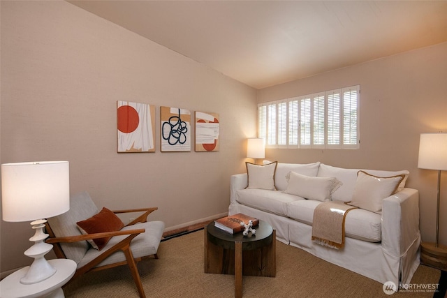 living area with lofted ceiling