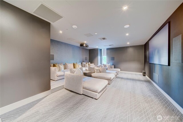 home theater featuring carpet floors, recessed lighting, visible vents, and baseboards