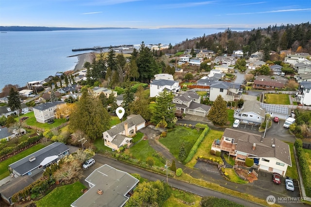 aerial view with a water view and a residential view