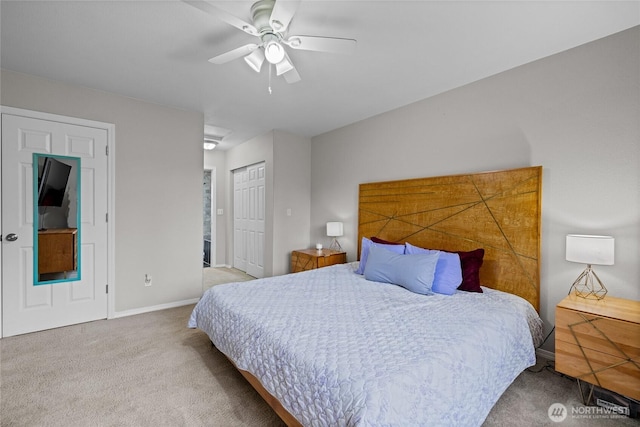 bedroom with carpet floors, a closet, baseboards, and a ceiling fan