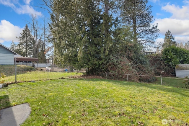 view of yard featuring fence