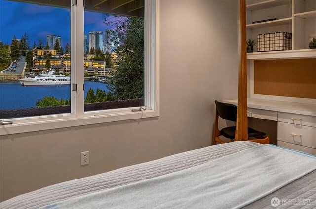 9330 SE Shoreland Dr, Bellevue, WA 98004 - unfurnished bedroom with a view of city, a water view, and built in desk