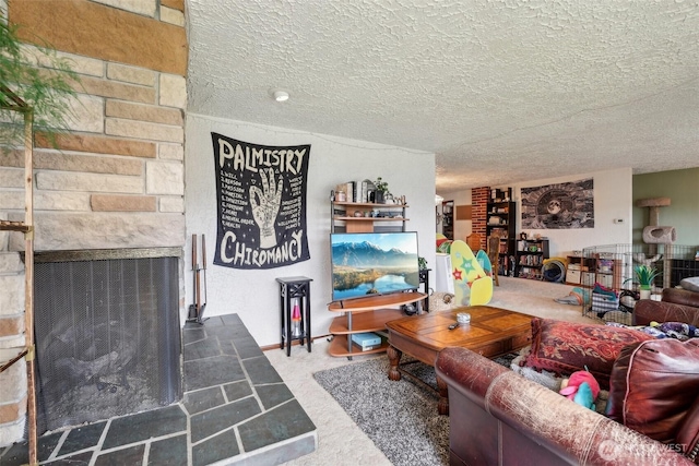 carpeted living room with a textured ceiling and a fireplace