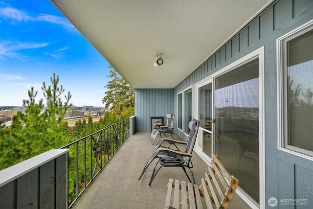 balcony featuring a sunroom