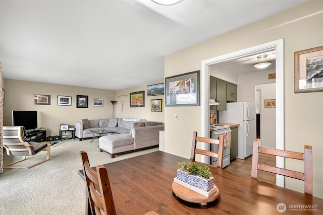 view of carpeted dining room