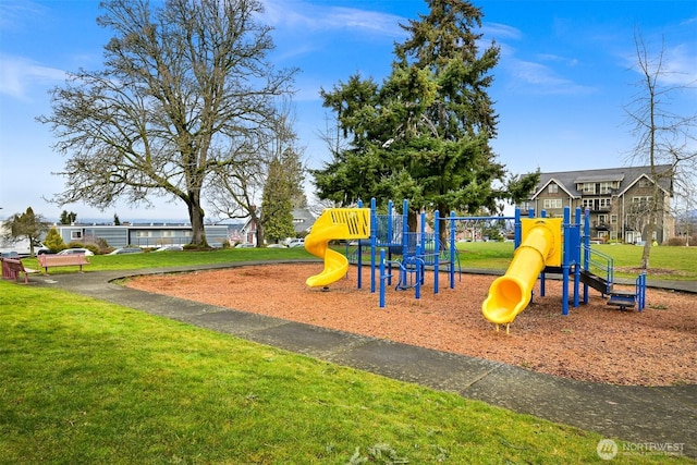 communal playground with a lawn