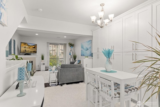 dining room featuring recessed lighting and a notable chandelier