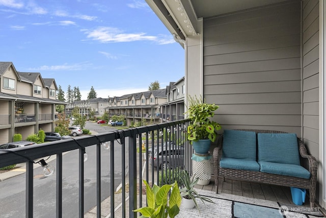 balcony featuring a residential view