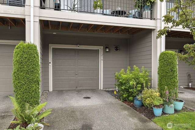 garage featuring driveway