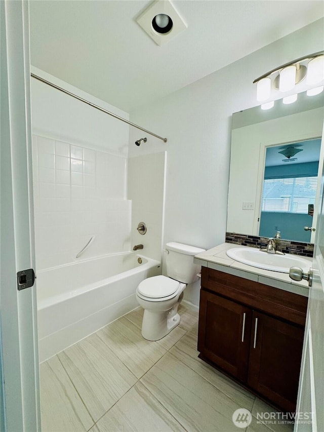 full bathroom with toilet, shower / bathtub combination, and vanity