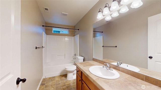 bathroom featuring toilet, visible vents, shower / washtub combination, and vanity