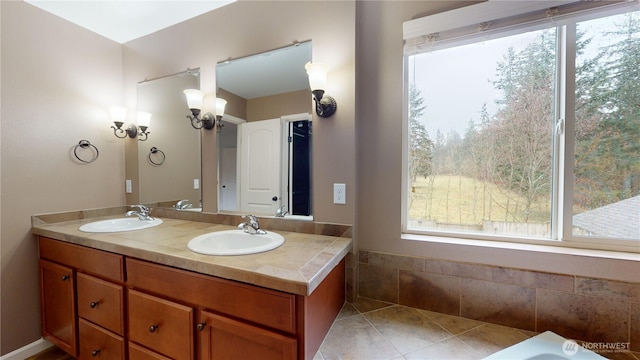 full bath with double vanity, tile patterned flooring, and a sink