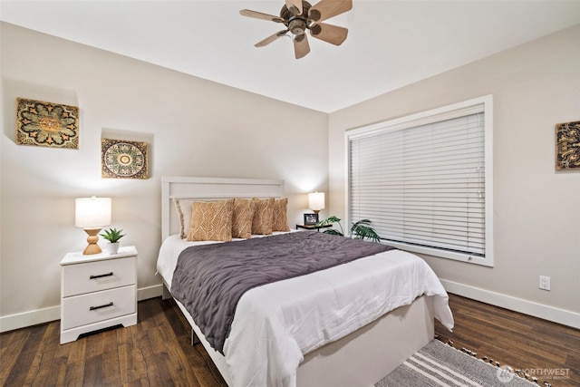 bedroom with wood finished floors, baseboards, and ceiling fan