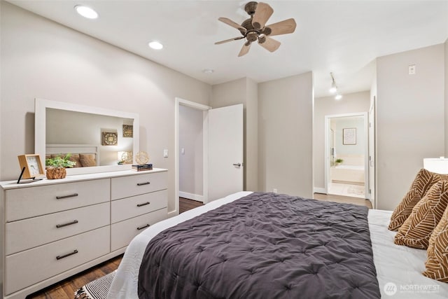 bedroom with recessed lighting, ensuite bath, dark wood finished floors, and ceiling fan