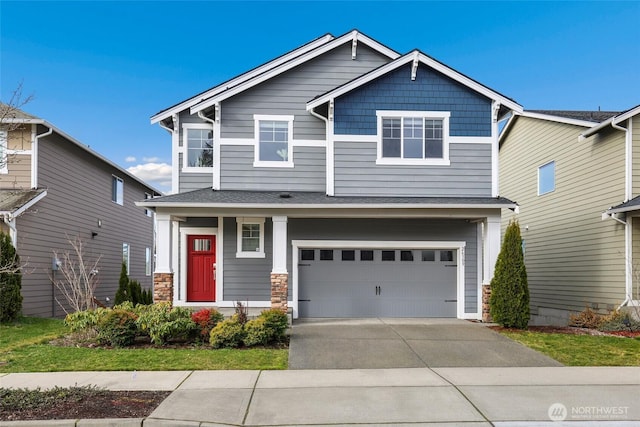 craftsman inspired home featuring stone siding, concrete driveway, and an attached garage