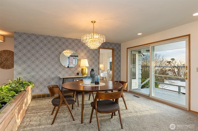 dining area with recessed lighting, visible vents, an accent wall, light carpet, and wallpapered walls