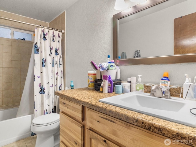 full bath featuring a textured wall, shower / bathtub combination with curtain, tile patterned floors, and vanity