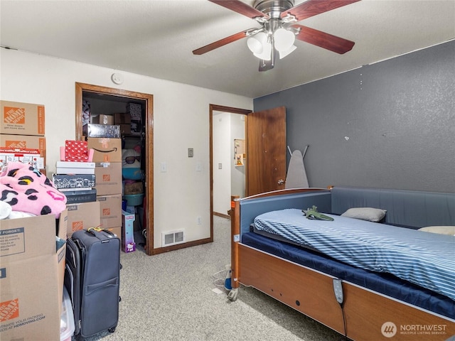 bedroom featuring visible vents, ceiling fan, light carpet, and baseboards