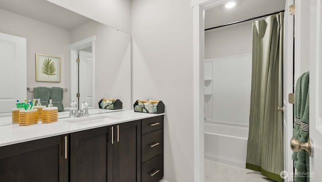 bathroom featuring shower / tub combo with curtain and vanity