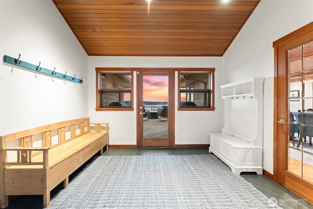 mudroom featuring lofted ceiling, wood ceiling, and baseboards